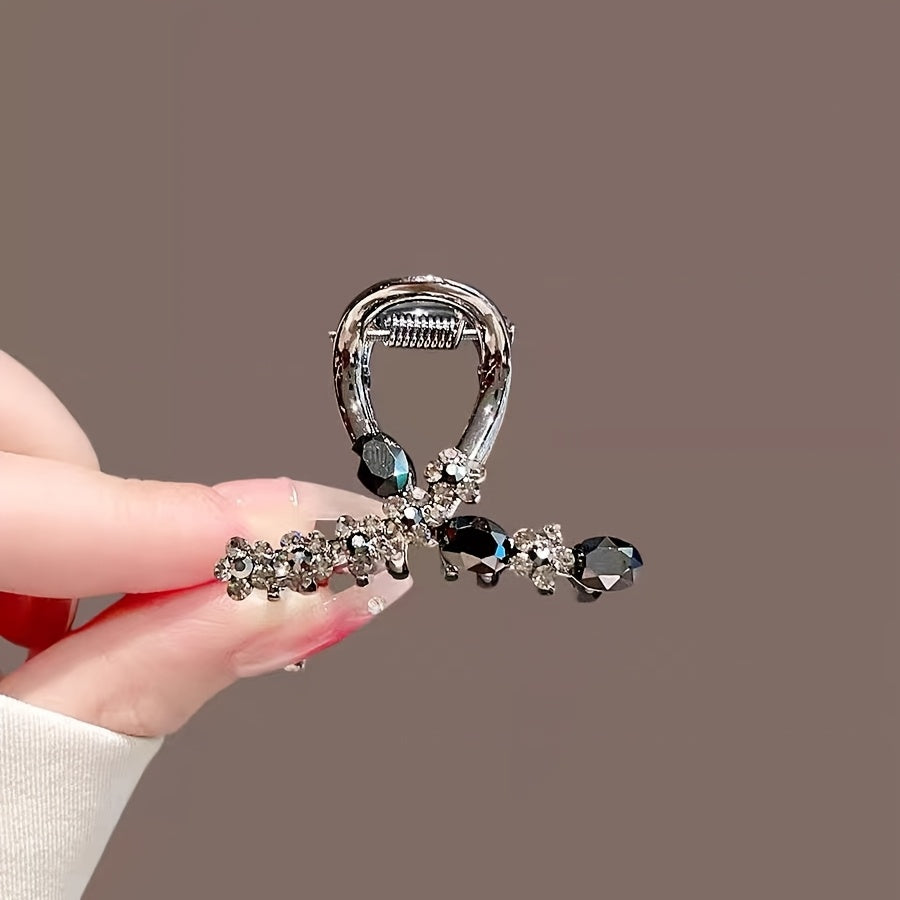 Luxury rhinestone flower hair clip with crystal detailing. Elegant mini shark claw clip