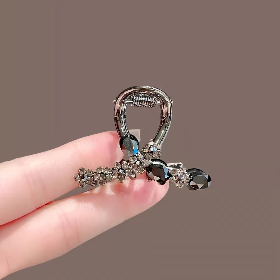 Luxury rhinestone flower hair clip with crystal detailing. Elegant mini shark claw clip