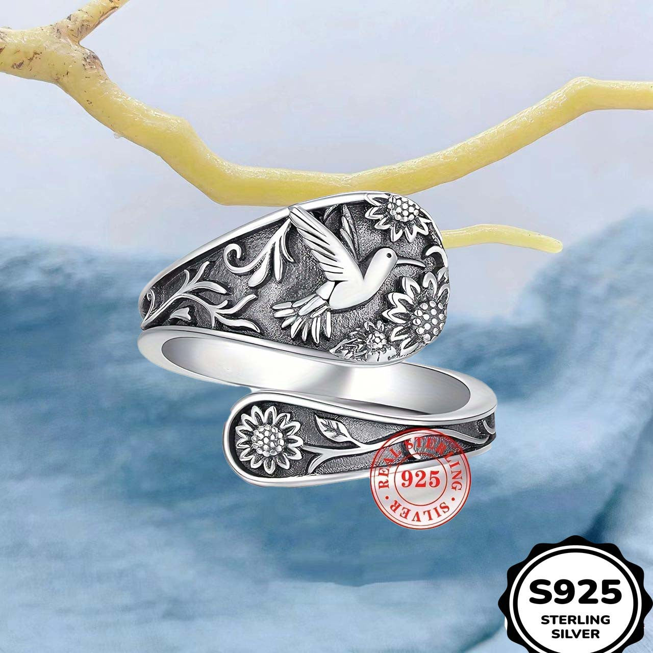 Vintage S925 sterling silver bohemian ring with engraved bird and floral details.