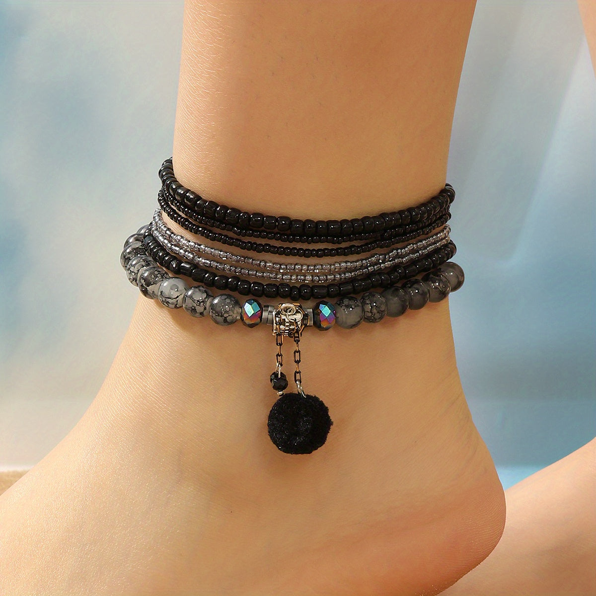 Bohemian Black Bead & Pom-Pom Anklet Set – 7pcs Adjustable Ankle Bracelets