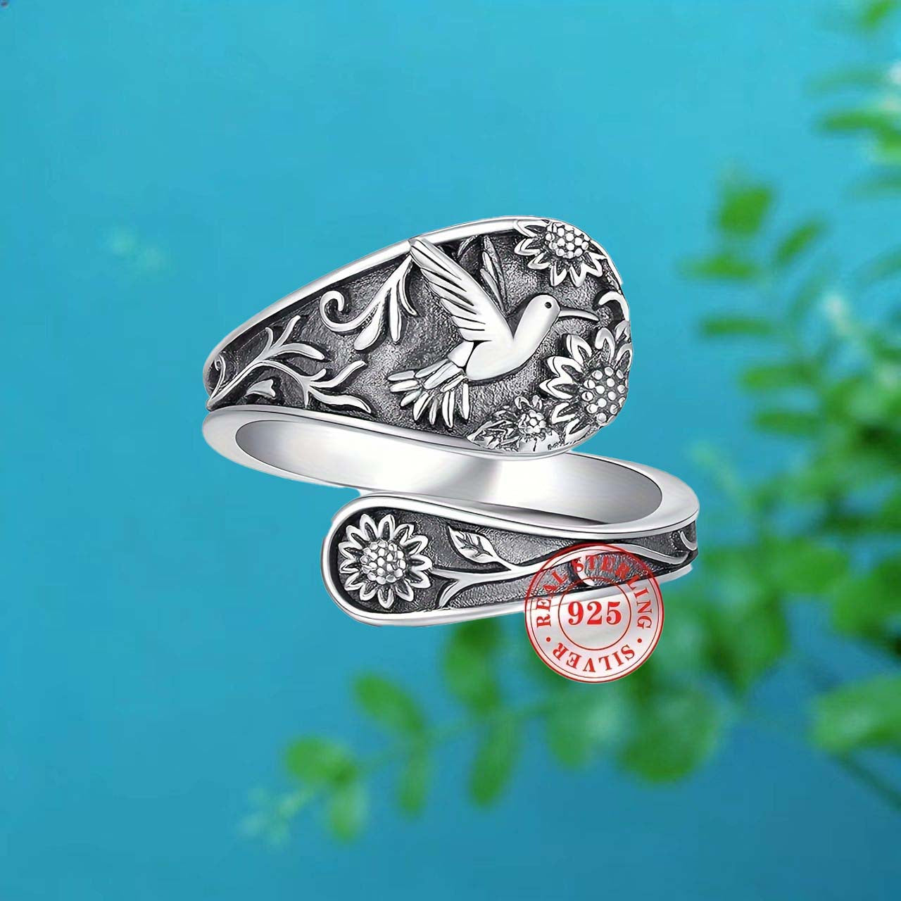 Vintage S925 sterling silver bohemian ring with engraved bird and floral details.