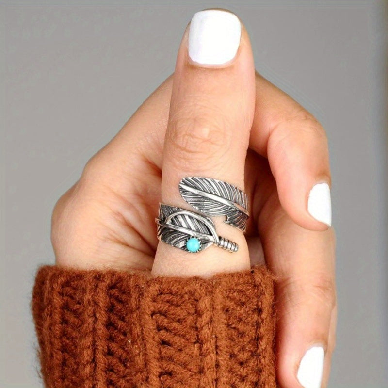 Vintage boho leaf open ring with synthetic turquoise. Adjustable gold-tone design