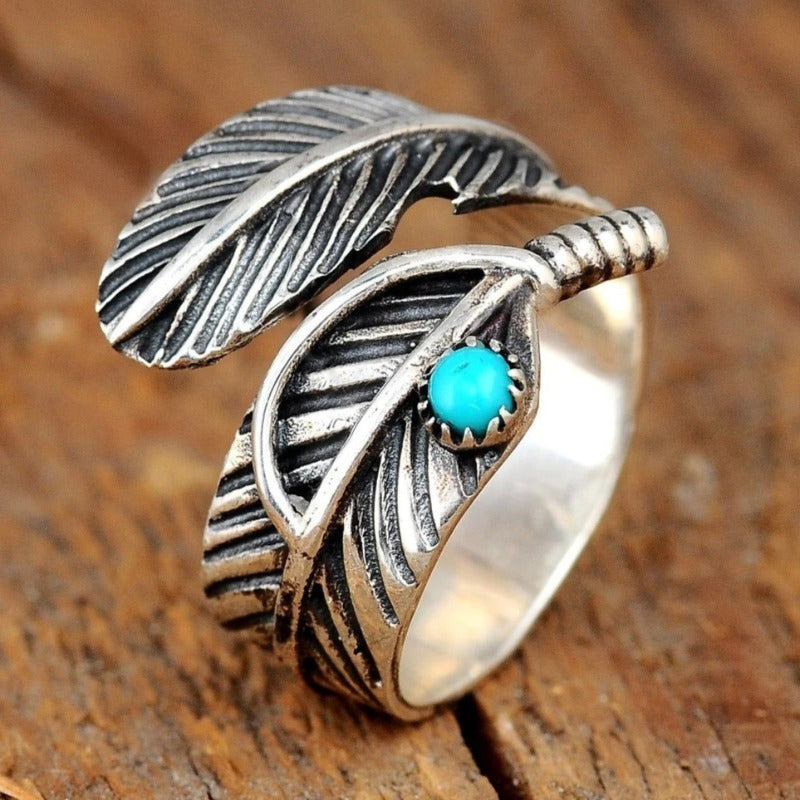 Vintage boho leaf open ring with synthetic turquoise. Adjustable gold-tone design