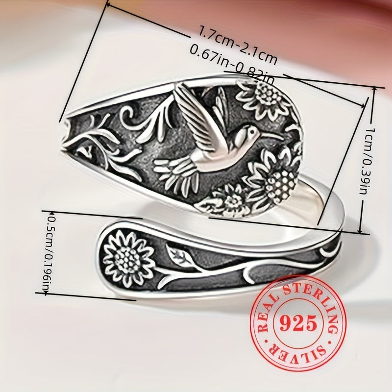 Vintage S925 sterling silver bohemian ring with engraved bird and floral details.
