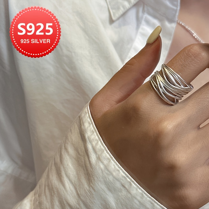 Wide adjustable 925 sterling silver ring with a vintage boho design