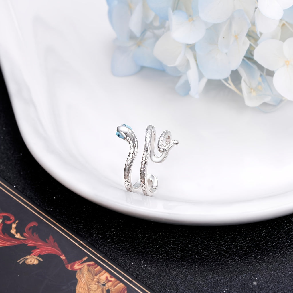 Adjustable S925 sterling silver snake ring with turquoise eyes.