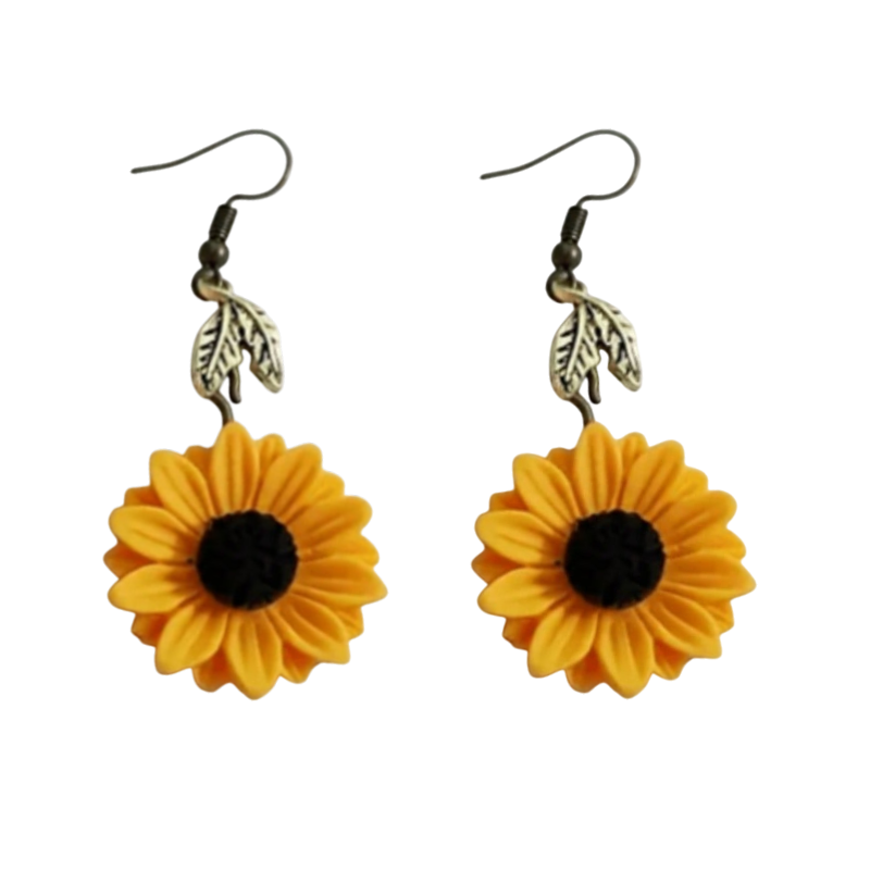 Sunflower earrings with leaf details on a white background