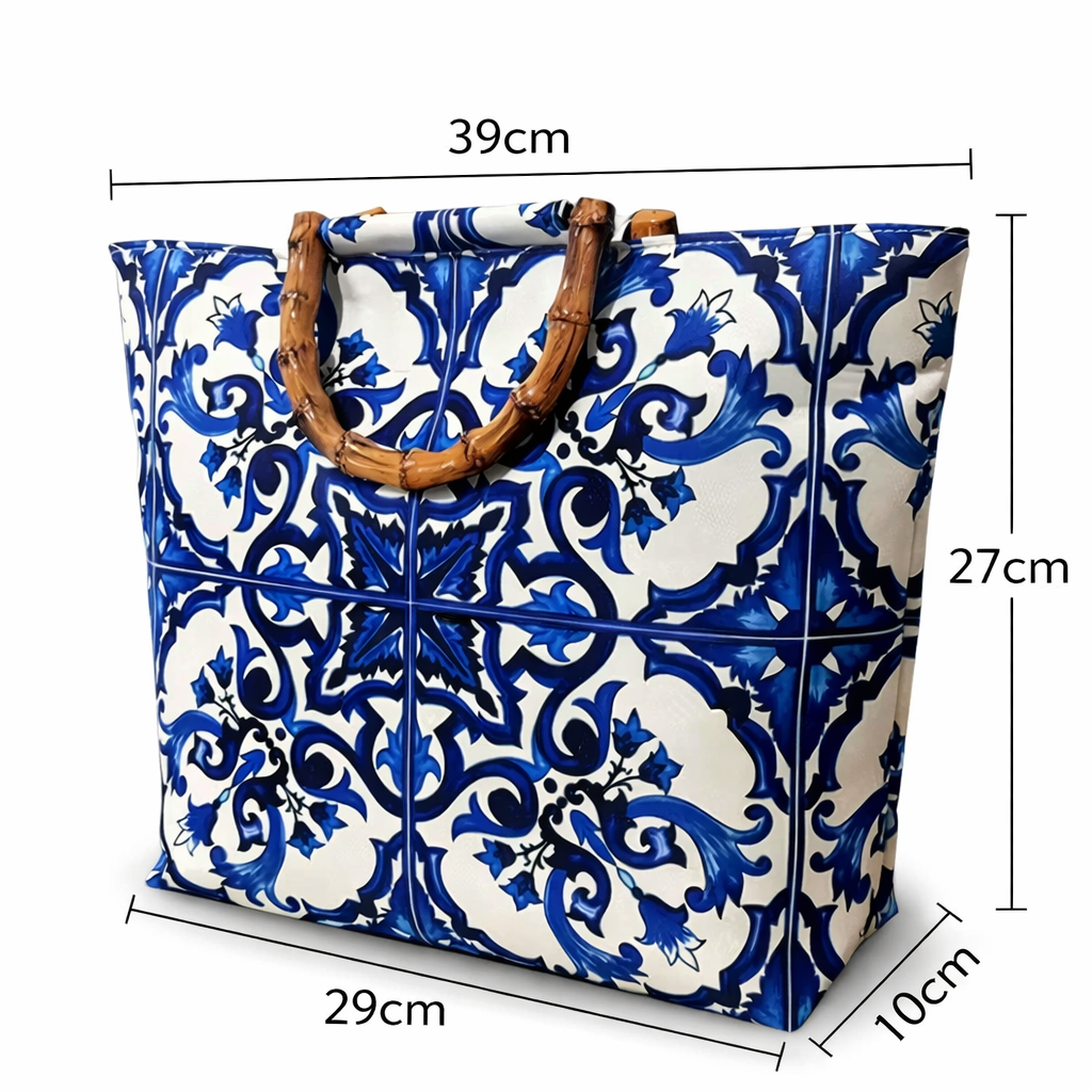 Tote bag with blue and white pattern and wooden handle, shown with measurements on a white background.