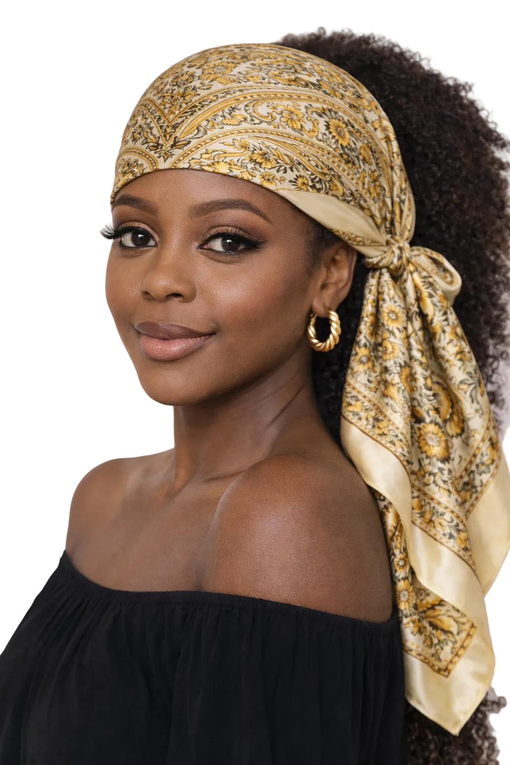 Woman wearing a gold patterned headscarf with a plain background