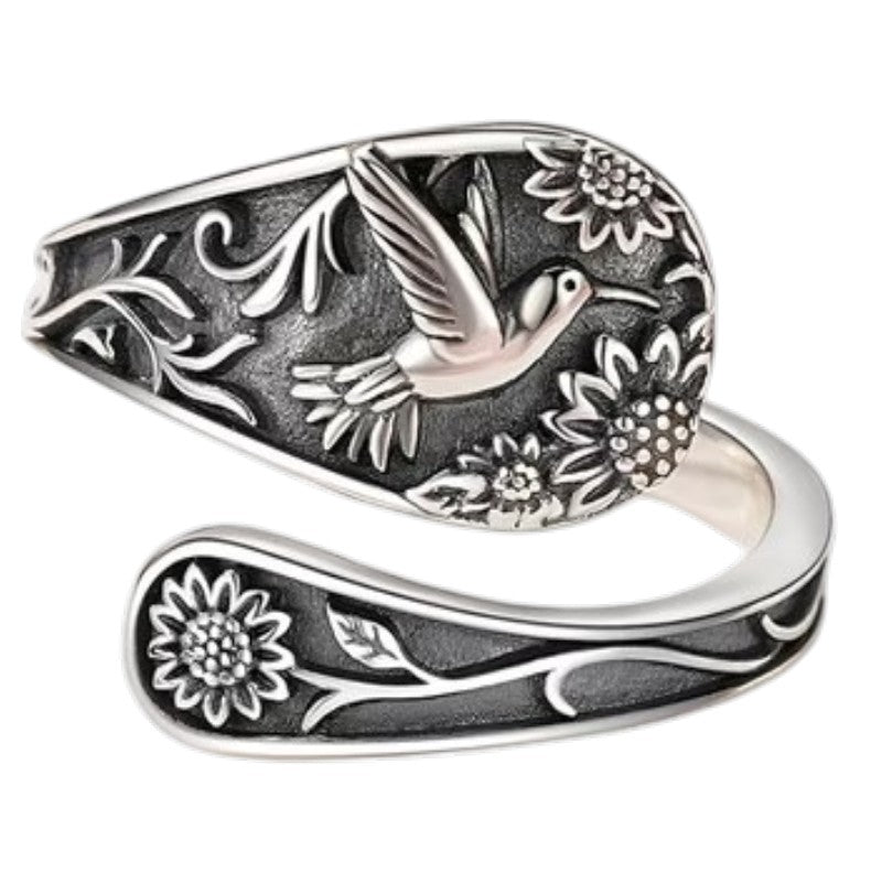 Vintage S925 sterling silver bohemian ring with engraved bird and floral details.