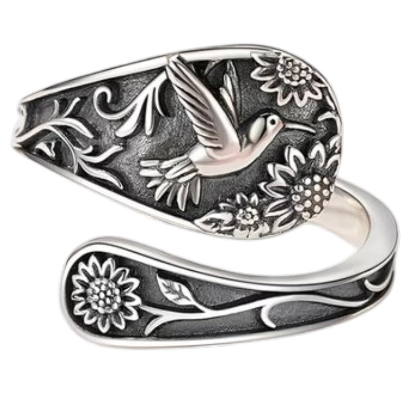 Vintage S925 sterling silver bohemian ring with engraved bird and floral details.