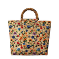 Floral embroidered jute bag with wooden handle on a white background