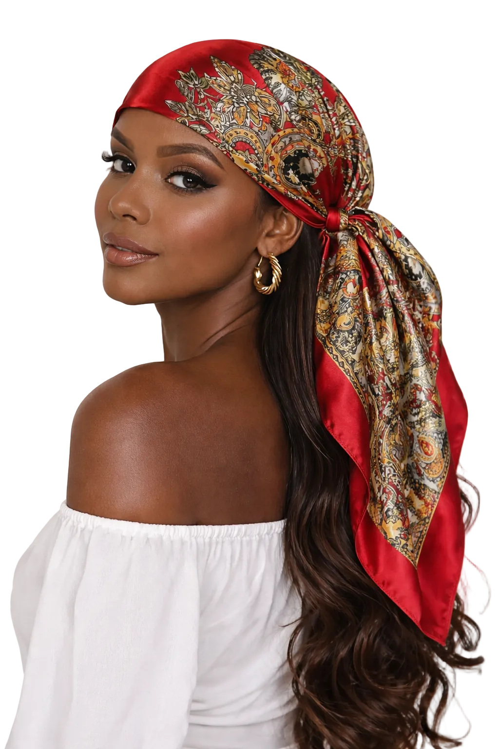 Woman wearing a red headscarf with intricate patterns on a white background
