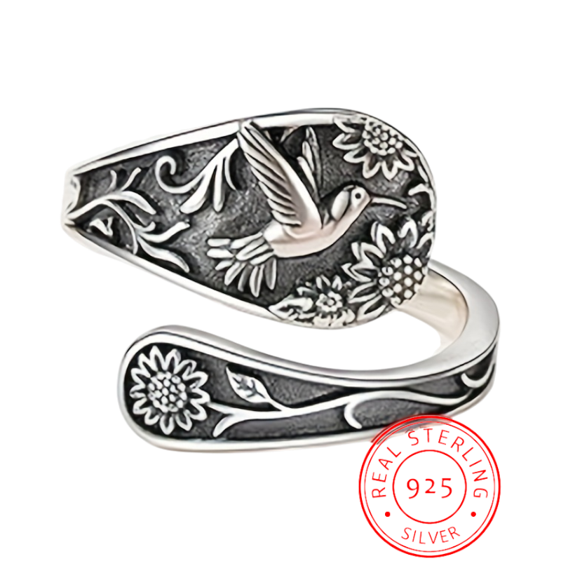 Vintage S925 sterling silver bohemian ring with engraved bird and floral details.